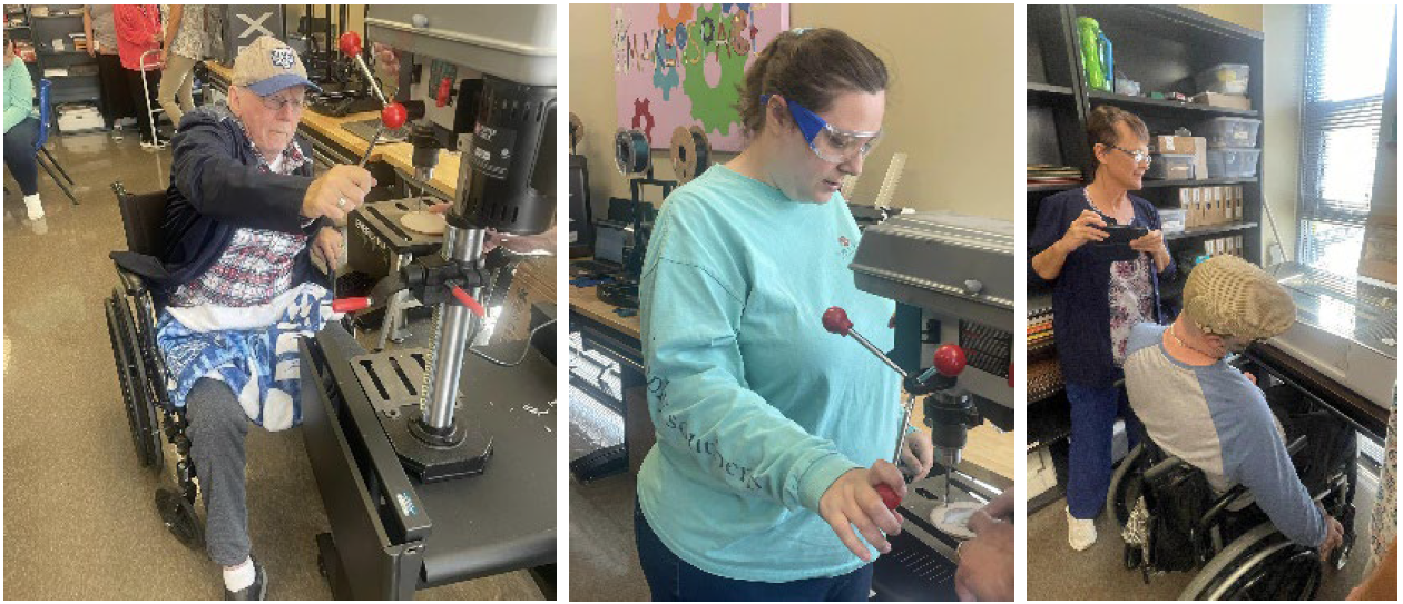 Adults working in the ACAT Makerspace