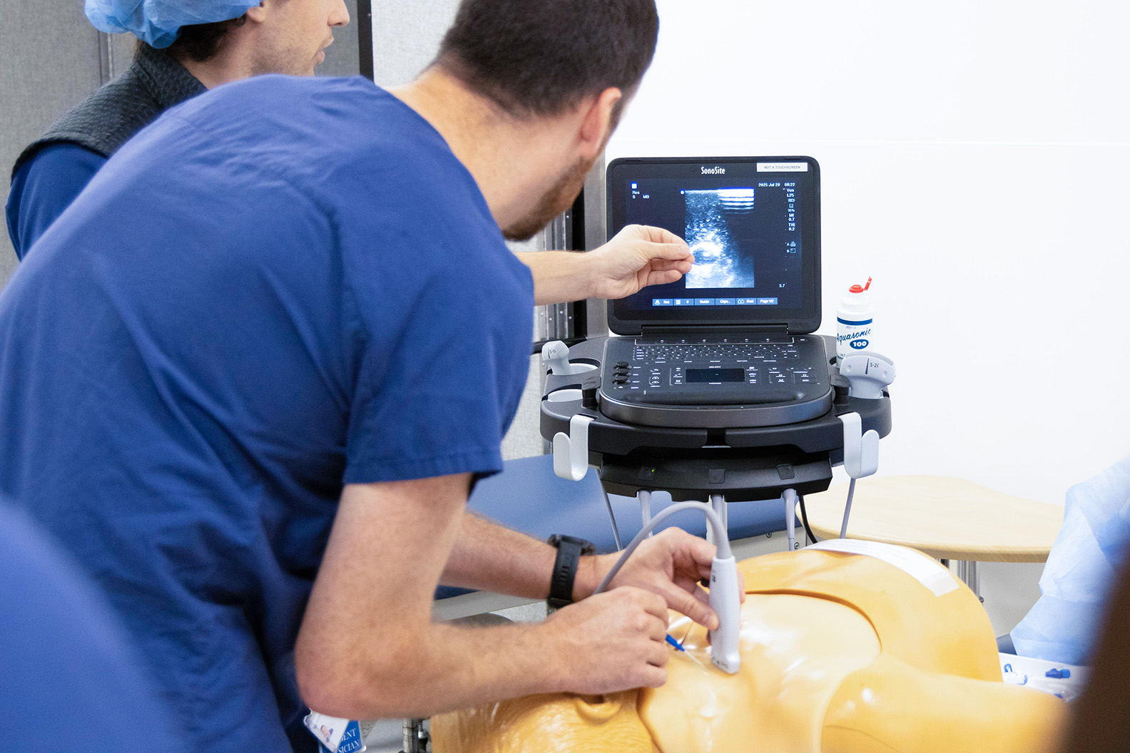 Two students working in the simulation lab