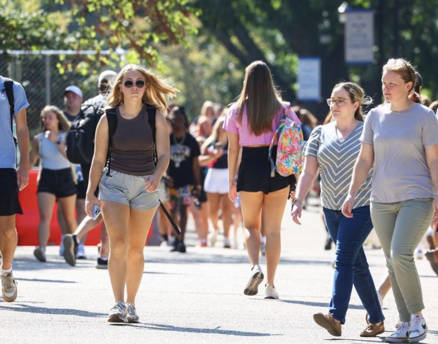 Students walking on UK's campus. 