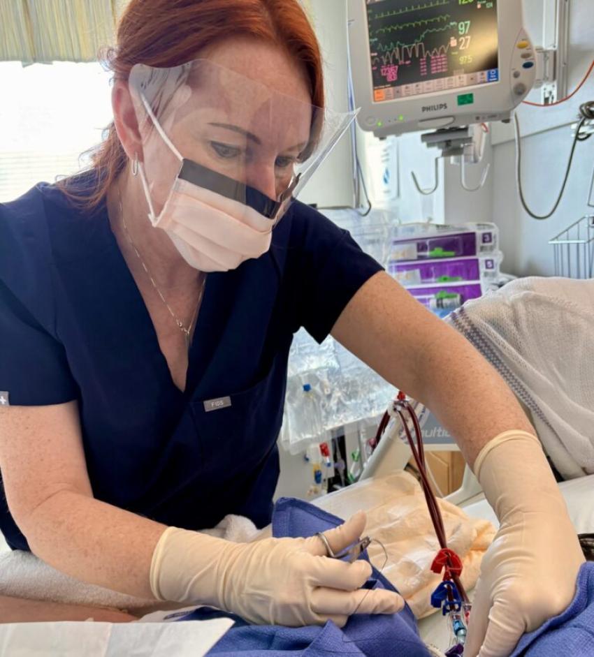 Onieta Stewart working on a patient