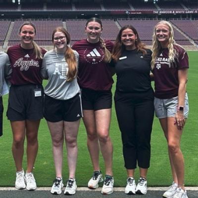Katie Phillips standing alongside other AT immersion students