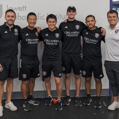 Kenta Mizumoto with Orlando City SC staff