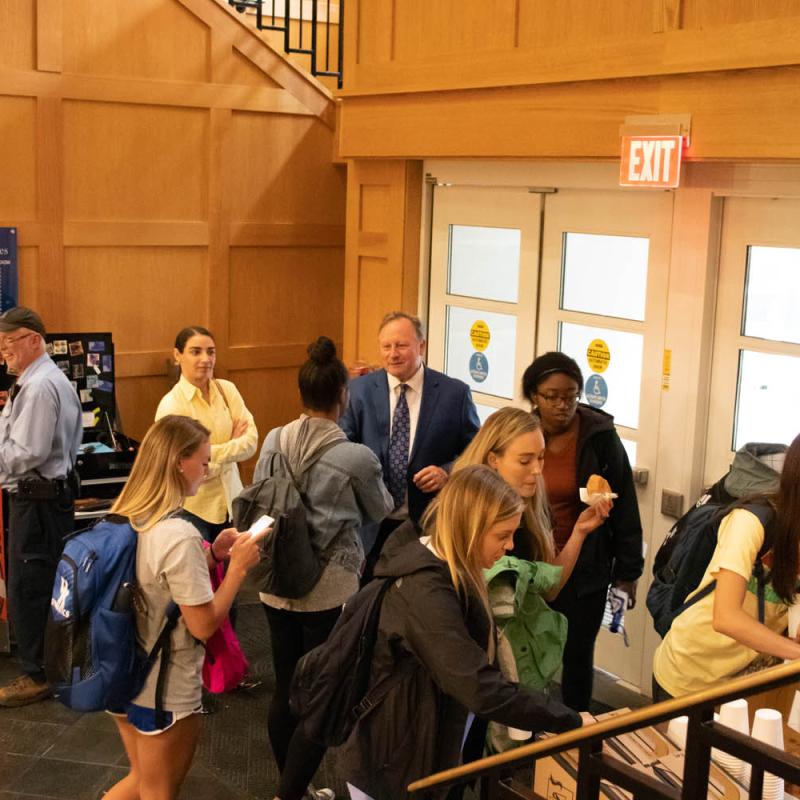 Students Gathering at Donuts with the Dean