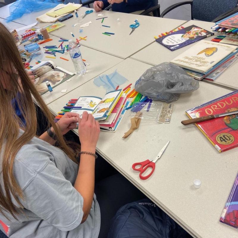 Student working on adapting toy