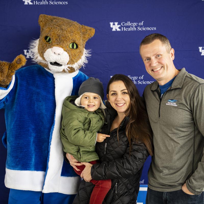 The Fry family with the Wildcat mascot