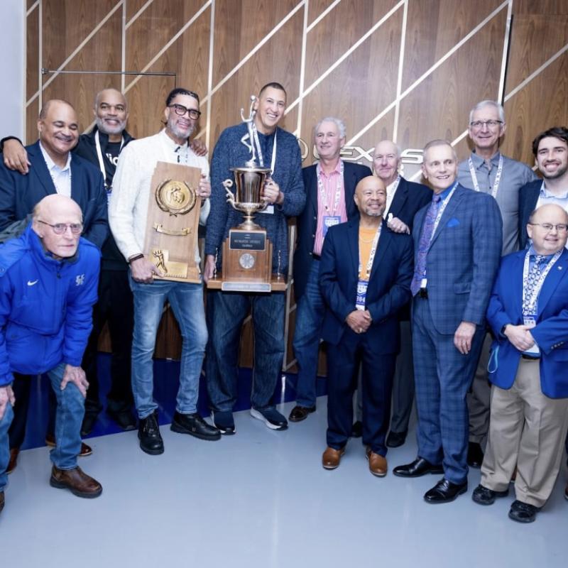 Tim Uhl with Basketball Team