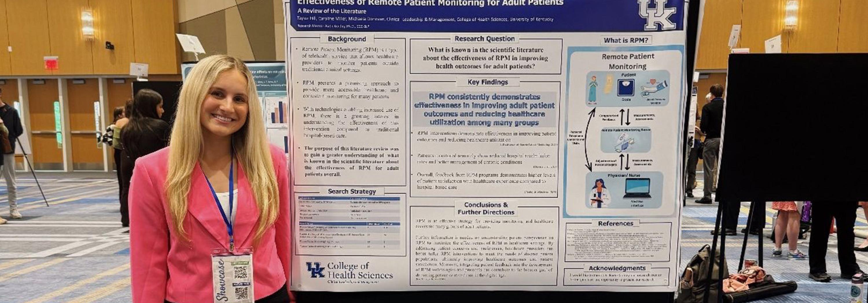 CLM student presenting a research poster