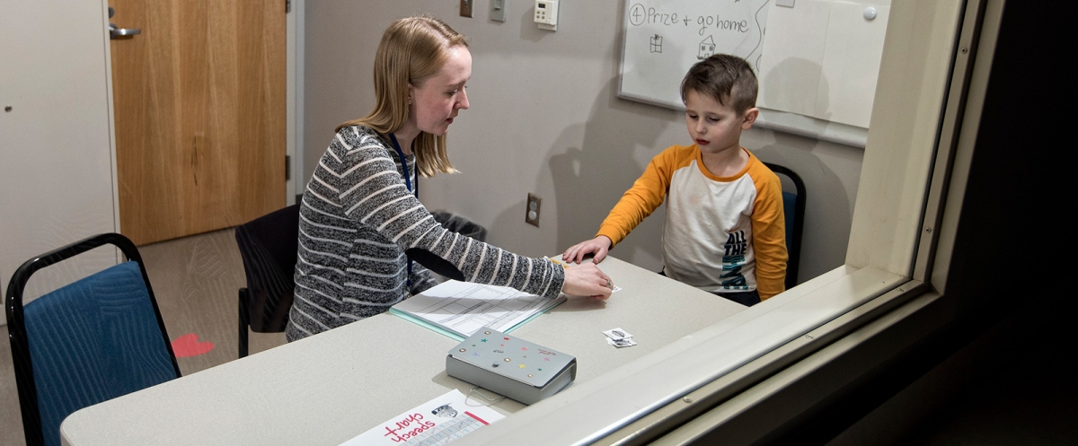 SLP with Child Patient