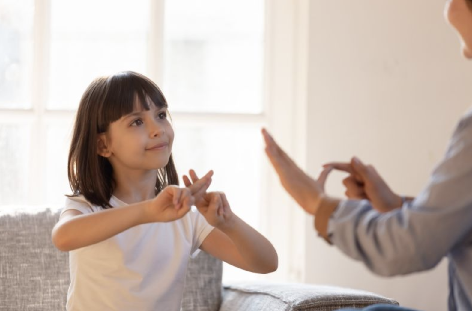 Child with disability performing learning exercise